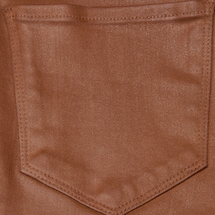 Close-up of a brown Selma Coated Bootcut Jean pocket, crafted from leather-alternative denim with visible detailed stitching and texture. The empty pocket is centered in the image.