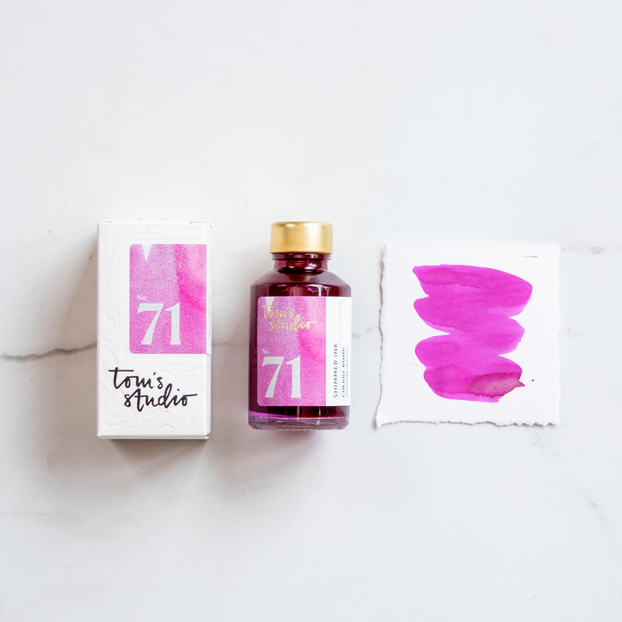 Tom's Studio Cherry Bomb Shimmer Fountain Pen Ink – featuring the packaging, bottle and a swatch on paper