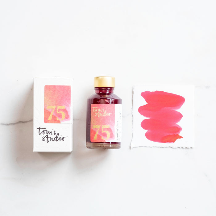 Tom's Studio Watermelon Shimmer Fountain Pen Ink – featuring the packaging, bottle and a swatch on paper