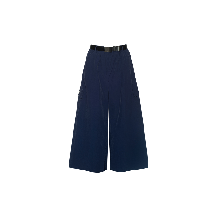 Shoda Cropped Wide-Leg Pant in navy blue, featuring a wide-leg cropped silhouette, side pockets, and a black belt, displayed on a white background.