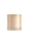Beige candle with 'Boy Smells' branding on a white background