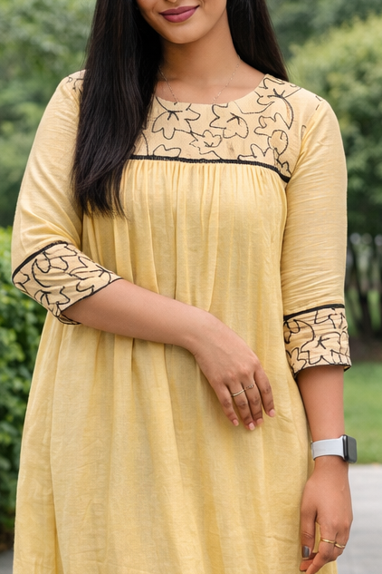 Soft beige shaded viscose mul chanderi A-line kurti with black floral thread embroidered yoke MBS-841