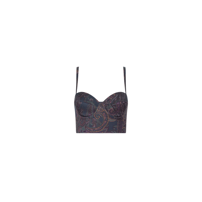 The Sonya Bustier is a cropped top with thin straps, showcasing a navy paisley pattern on a fitted silhouette with built-in support, displayed against a plain white background.