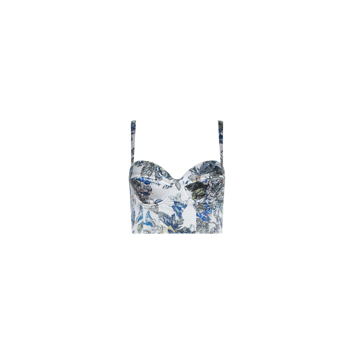 The Sonya Silk Bustier features a fitted silhouette with blue and green botanical prints on a white background. This bustier top includes thin shoulder straps and a sweetheart neckline, all showcased against a plain white backdrop.