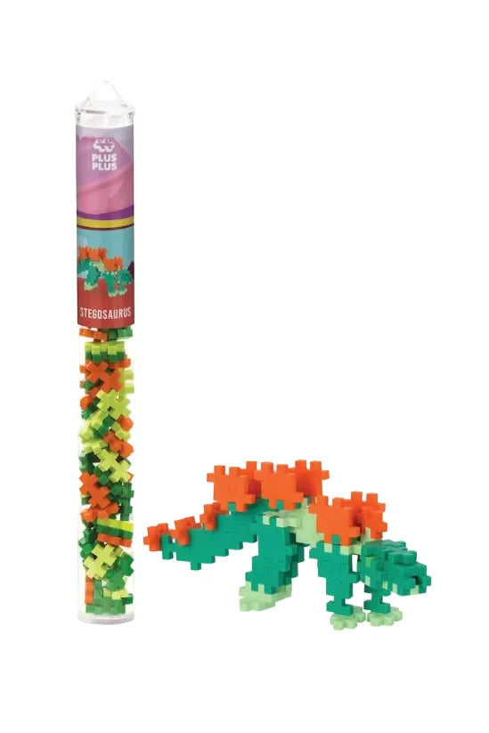 Colorful dinosaur building blocks set with packaging on a white background