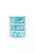 Three stacked containers with blue and white splatter pattern on a white background