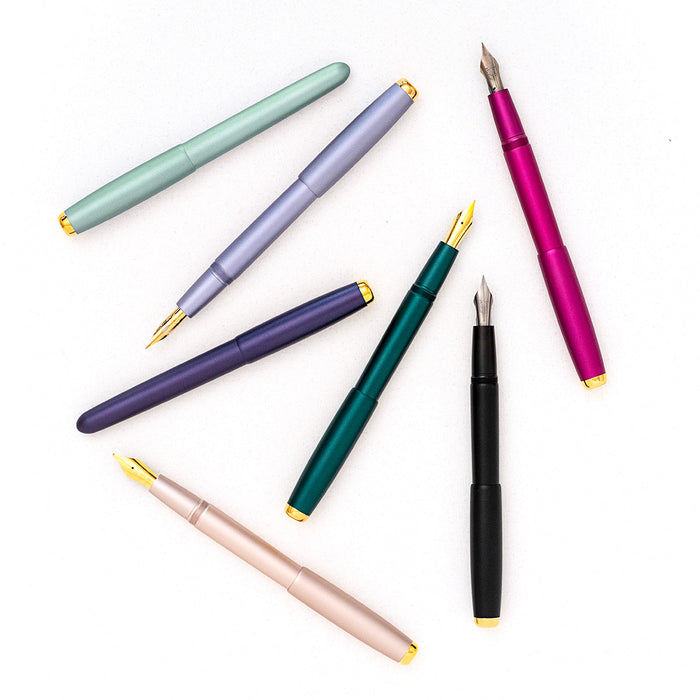 The Studio Fountain Pen in a range of colours, all fitted with a different fountain pen nib