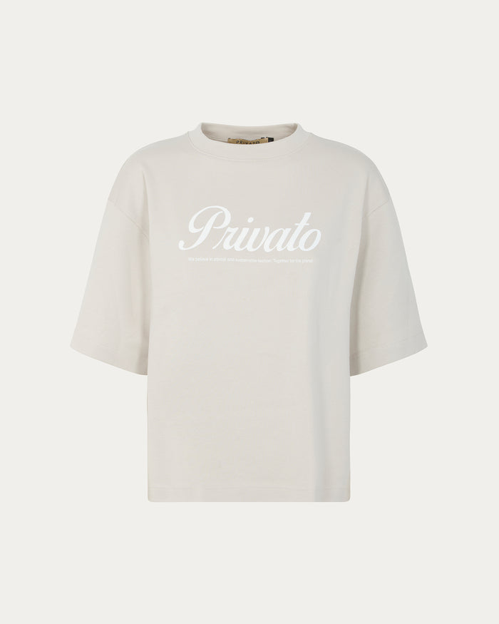 T-shirt beige con logo e maniche scese