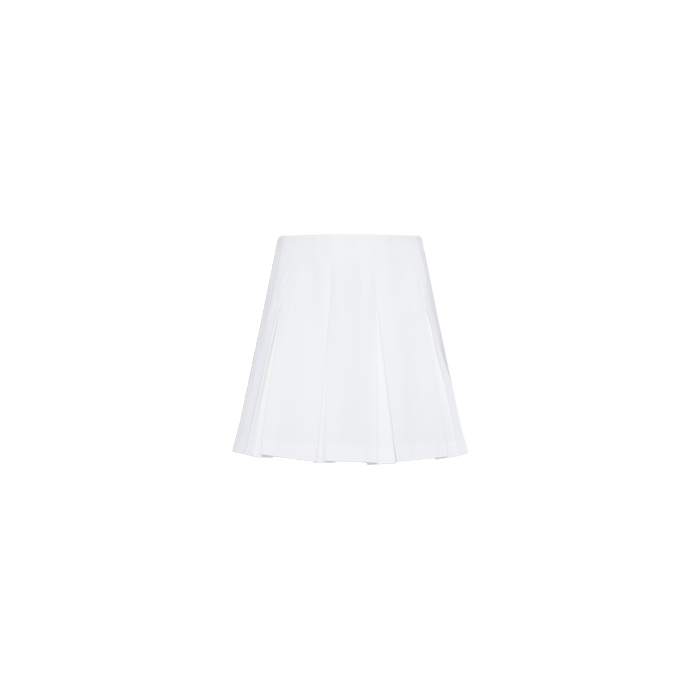 The Tania Pleated Mini Skirt, shown in white, is displayed on a plain white background.