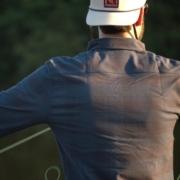 back of blue and black flannel