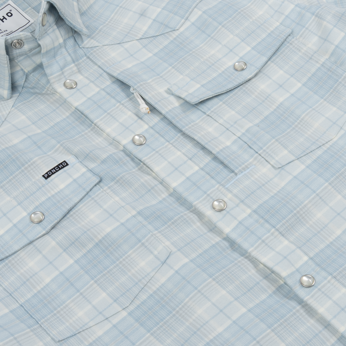 Light blue plaid button-up shirt with snap buttons and chest pockets