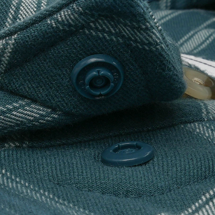 Close-up of buttons on The Codfather shirt in textured fabric