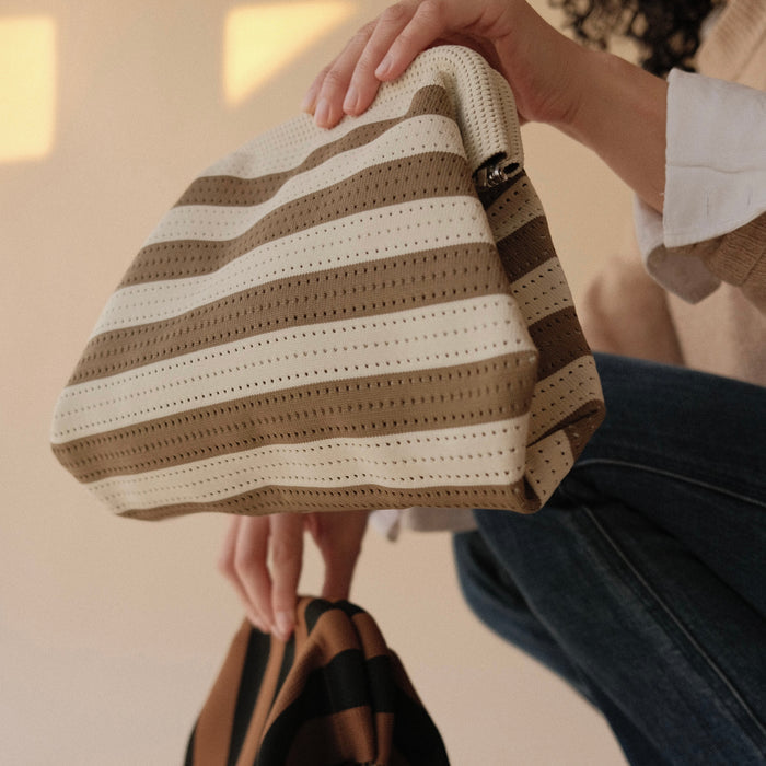 The Cream Everywhere Clutch A Bag Concept