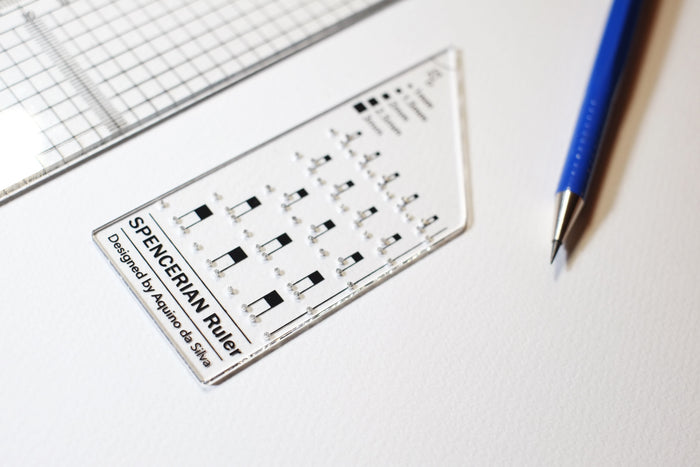 A close up of the Spencerian calligraphy ruler by Aquino da Silva