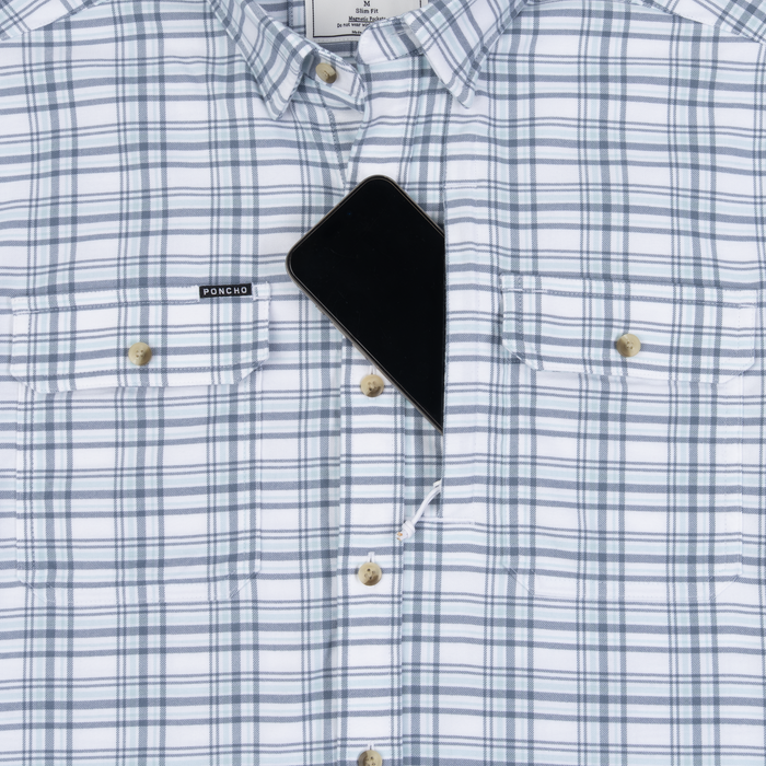 The Fog Horn plaid shirt with front pockets holding a smartphone