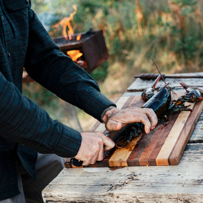 The Gloucester dark plaid shirt worn while preparing lobster outdoors