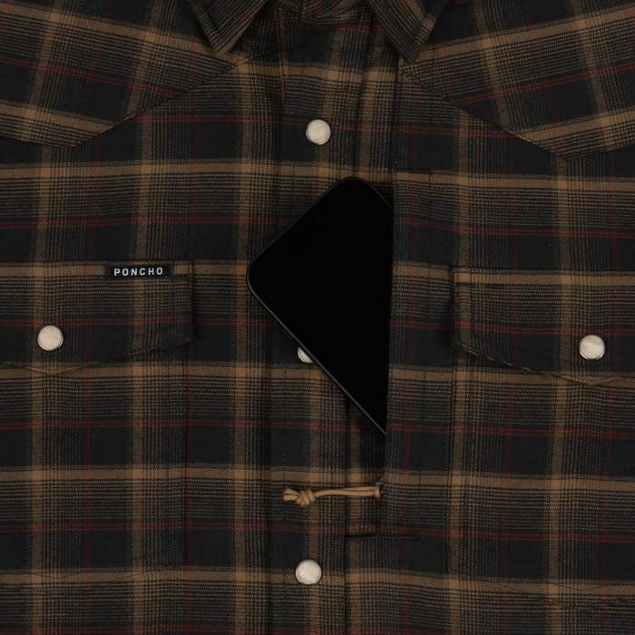 The John Colter plaid shirt with chest pockets and button closure, featuring a phone partially tucked inside one pocket