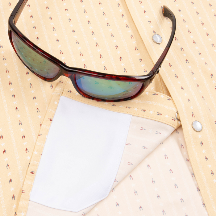 Closeup of sunglasses with lens cleaner on shirt