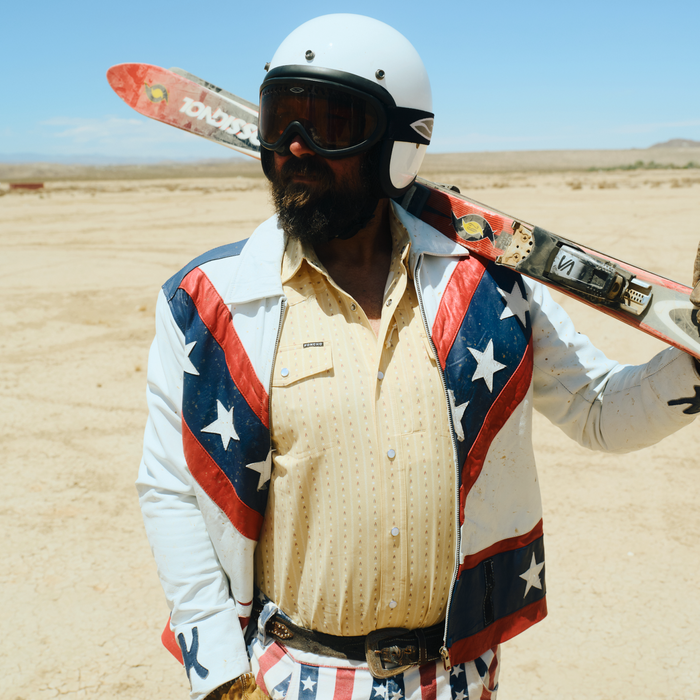 man in usa outfit and liberty bell shirt