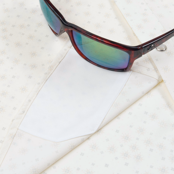 sunglasses with lens cleaner on shirt