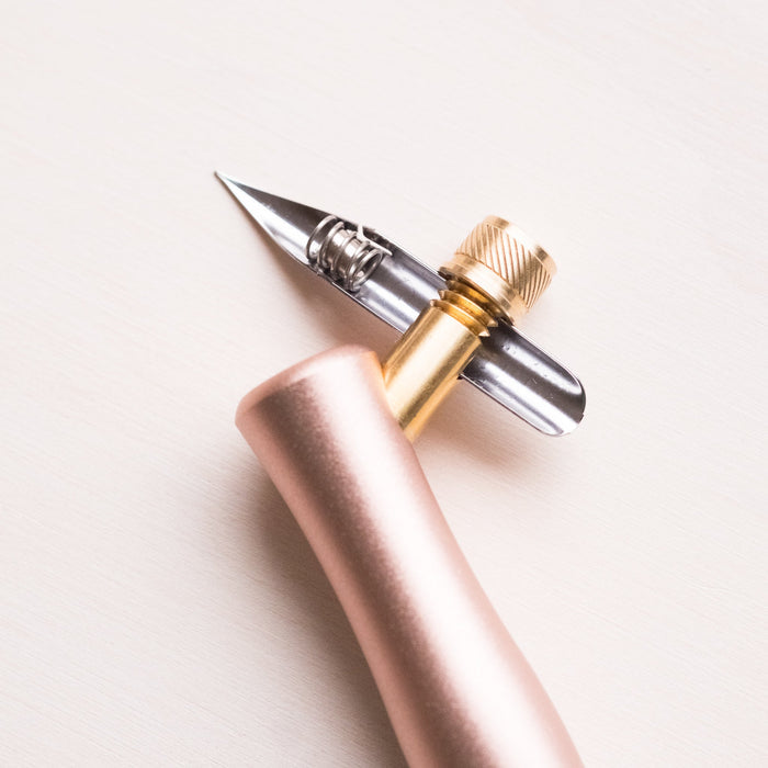 The 'One Dip Wonder' ink reservoir on an Nikko G nib fitted to an oblique Flourish calligraphy pen