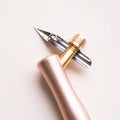 The 'One Dip Wonder' ink reservoir on an Nikko G nib fitted to an oblique Flourish calligraphy pen