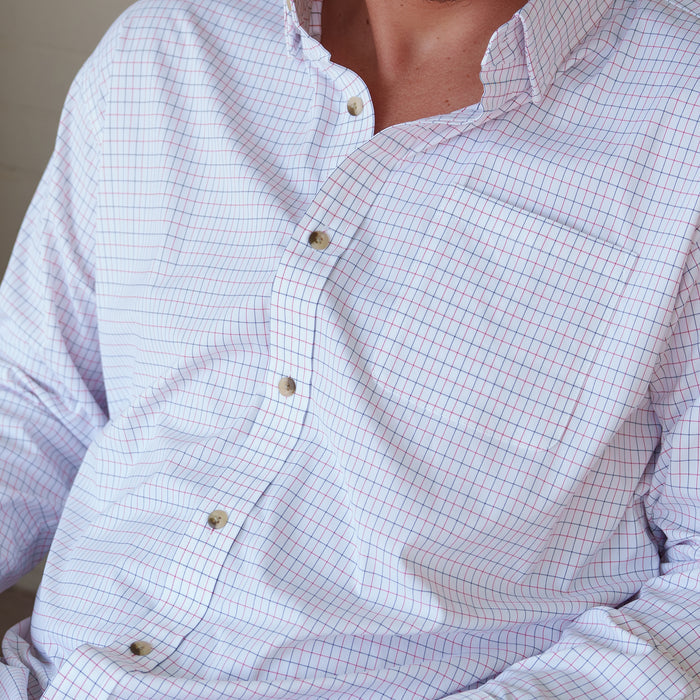The Open Flame white checkered button up shirt worn by a person