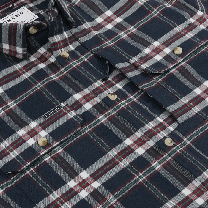Close-up of The Willamette plaid shirt with button details and chest pockets