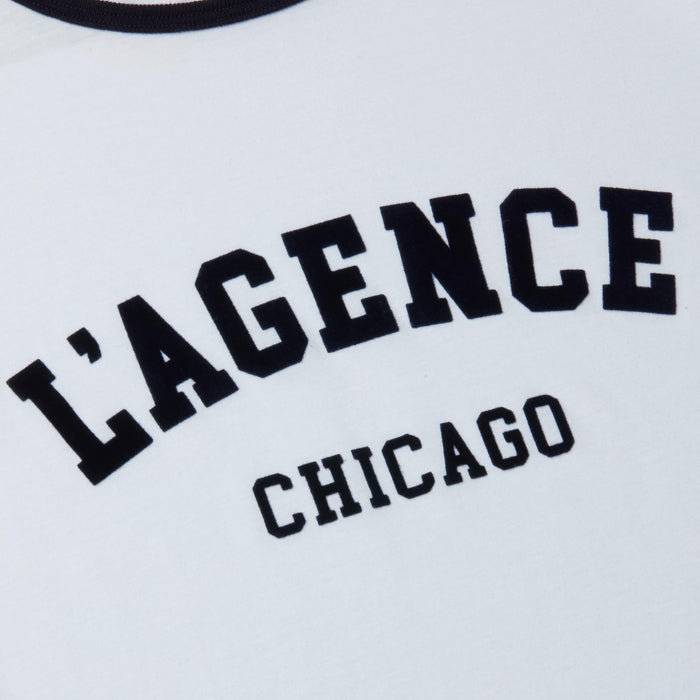 Introducing the Tommie Crewneck Tee—a relaxed fit white ringer tee featuring “LAGENCE CHICAGO” boldly printed across the front. Crafted from premium Supima cotton for exceptional comfort.