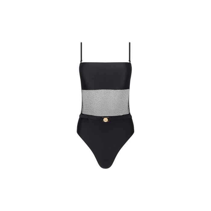 The Tory Bandeau One-Piece Swimsuit is a black one-piece featuring thin straps, chic mesh insets across the midsection, and a subtle gold accent at the waist.