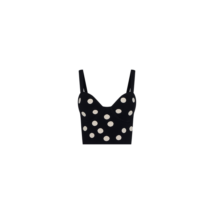 Tula Knit Bra Top in black, featuring jacquard polka dots, thin shoulder straps, and a sweetheart neckline in a corset-style design—displayed on a plain white background.