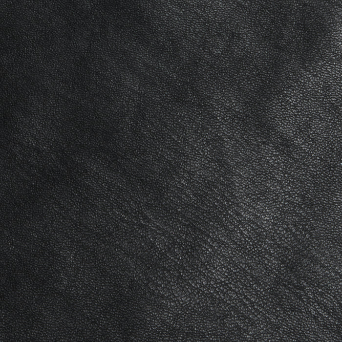 Close-up of the Tullia Scoopneck Tank in textured black vegan leather, showcasing its visible grain and subtle natural patterns throughout.