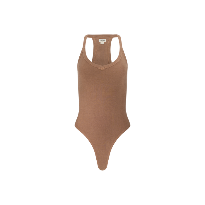 The Wrenna Racerback Bodysuit is a brown, sleeveless tank crafted from rib fabric, featuring a racerback design, scoop neckline, and high-cut leg openings, displayed against a plain white background.